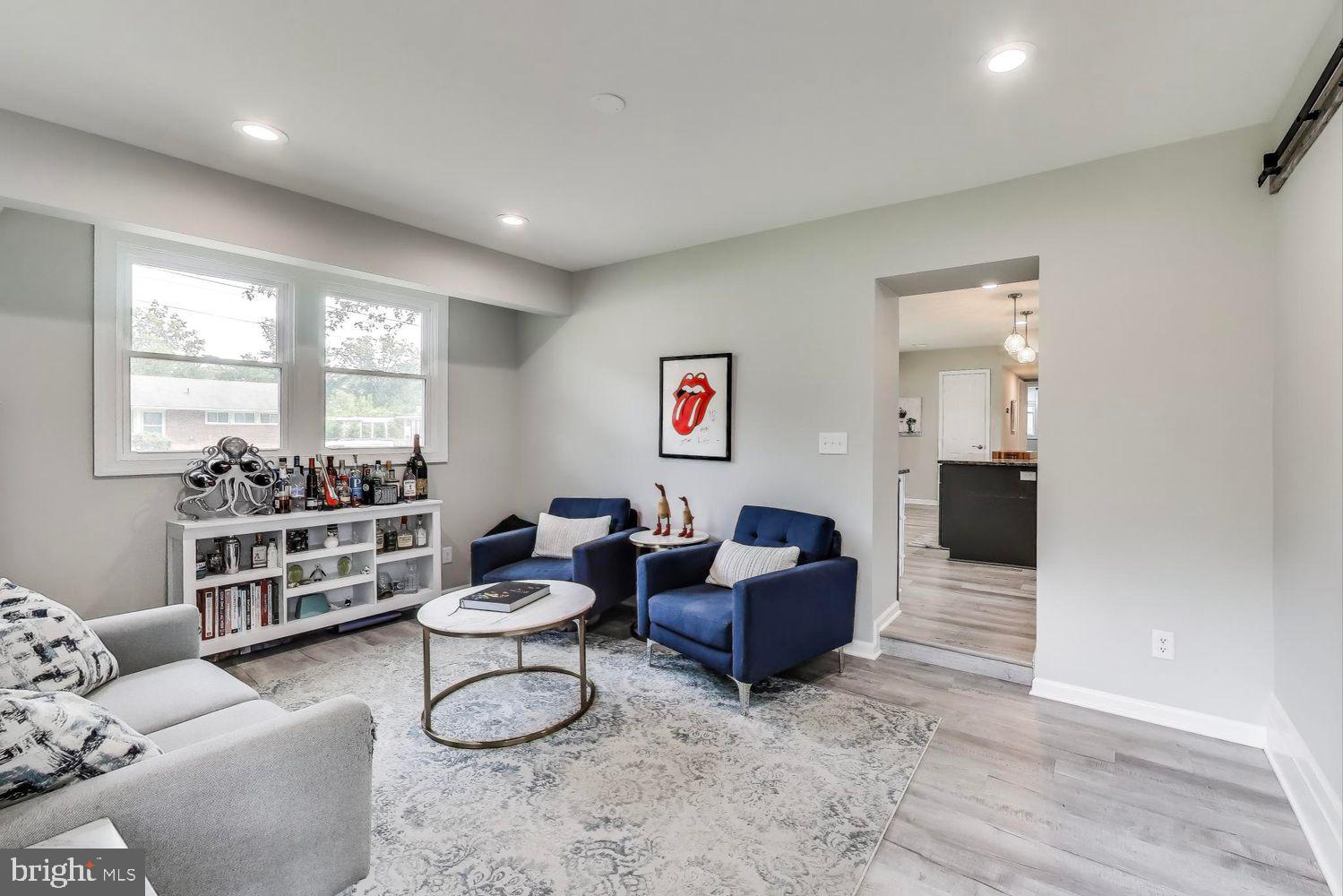 5408 Danville Street Springfield, VA 22151 - Photo 22 of 29 a living room with furniture and window