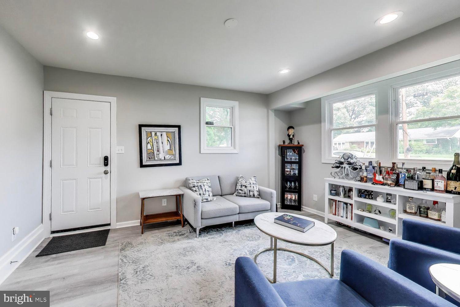 5408 Danville Street Springfield, VA 22151 - Photo 23 of 29 a living room with furniture window and wooden floor