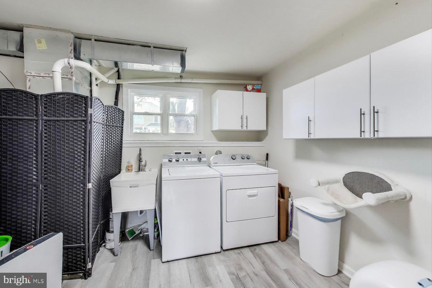 5408 Danville Street Springfield, VA 22151 - Photo 24 of 29 a utility room with dryer and washer