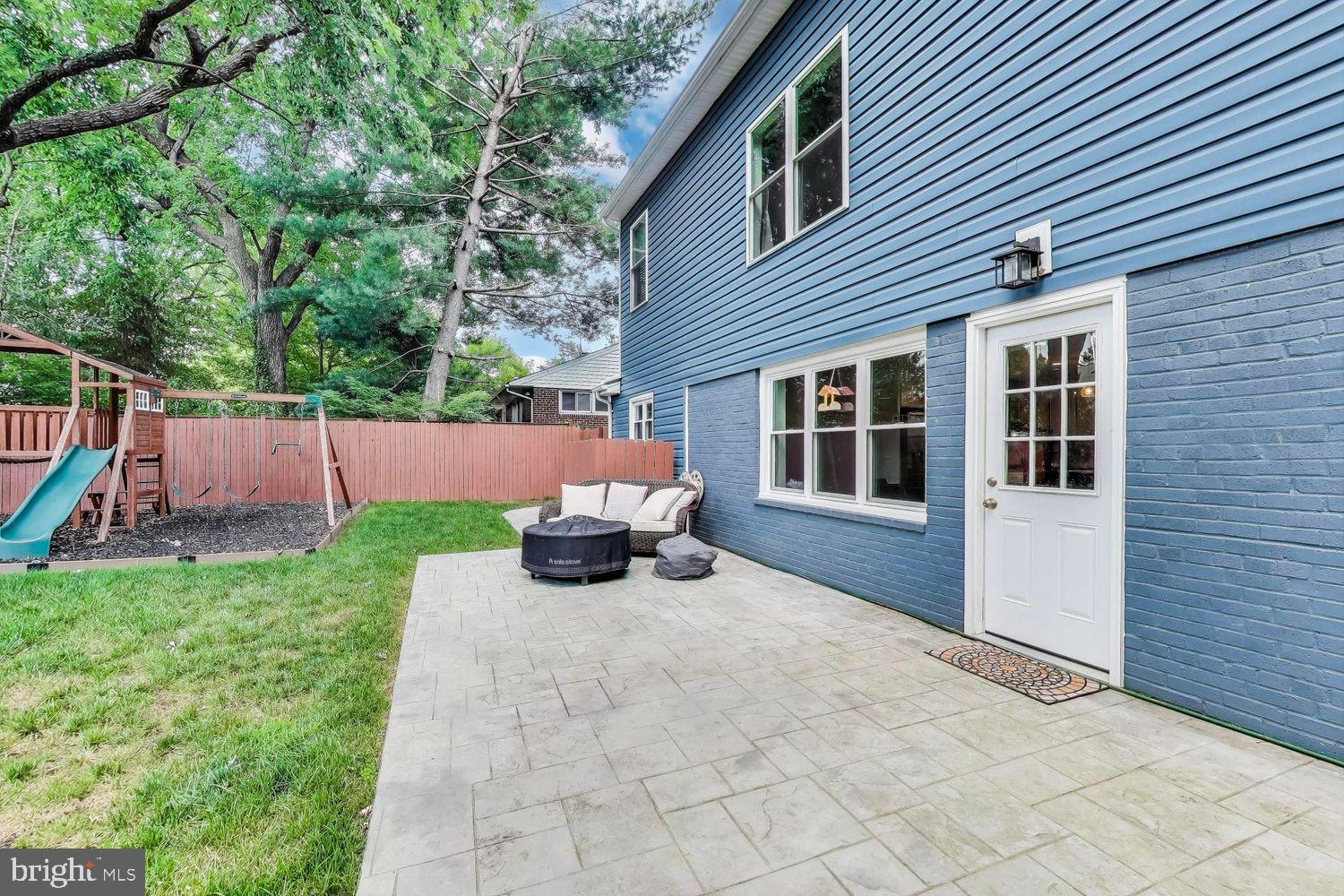 5408 Danville Street Springfield, VA 22151 - Photo 25 of 29 a view of a house with backyard and a tree