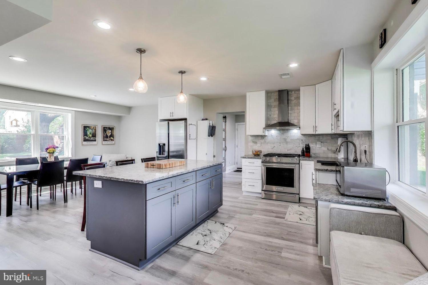5408 Danville Street Springfield, VA 22151 - Photo 3 of 29 a kitchen with cabinets a sink and appliances