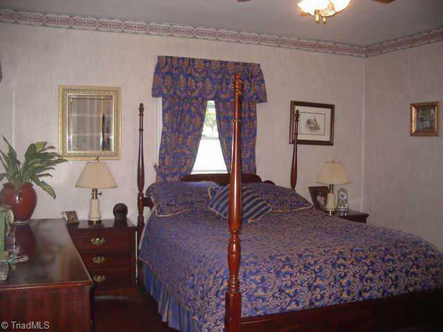 219 Model Farm Road High Point, NC 27263 - Photo 6 of 9 Other. The master bedroom overlooks the back yard and features a ceiling fan!