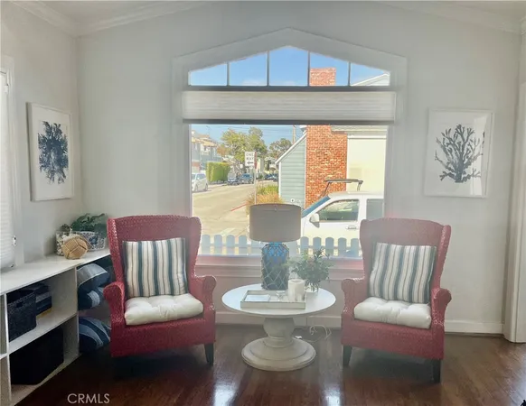 a living room with furniture fireplace and flat screen tv