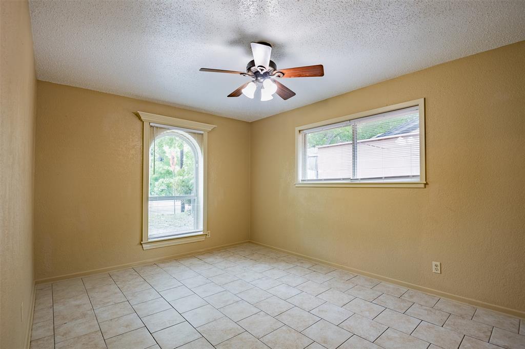 805 North Fielder Road Arlington, TX 76012 - Photo 13 of 17 a view of an empty room with window