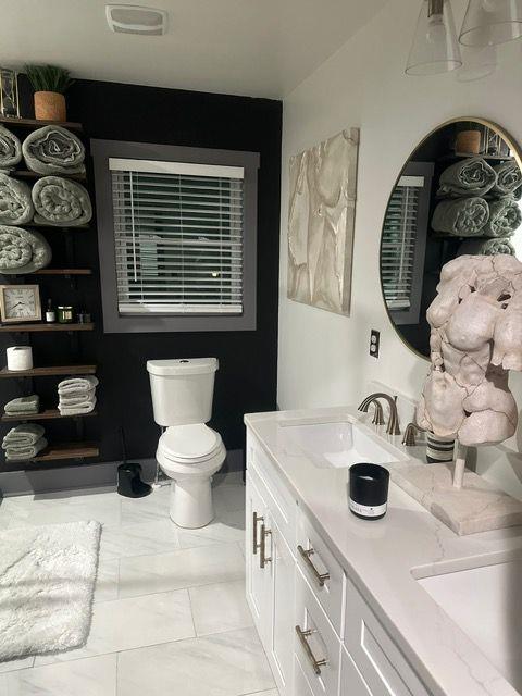 2434 Rockcliff Road Southeast Atlanta, GA 30316 - Photo 10 of 13 a bathroom with a sink and a mirror