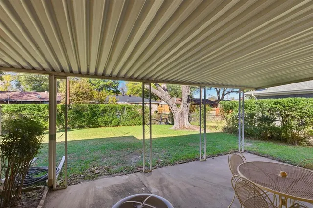 a view of a backyard with a garden