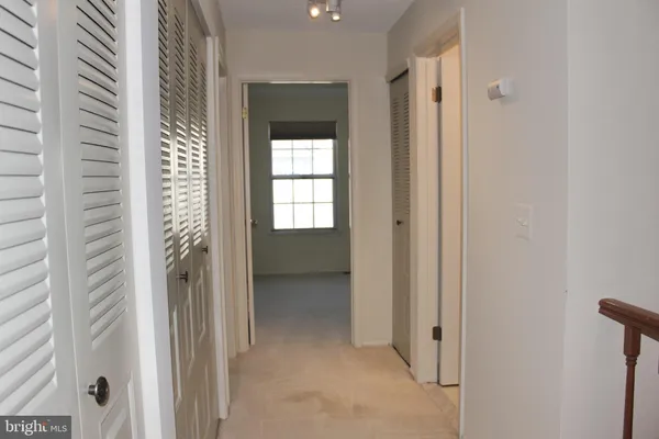 a view of a bathroom with a shower and a sink