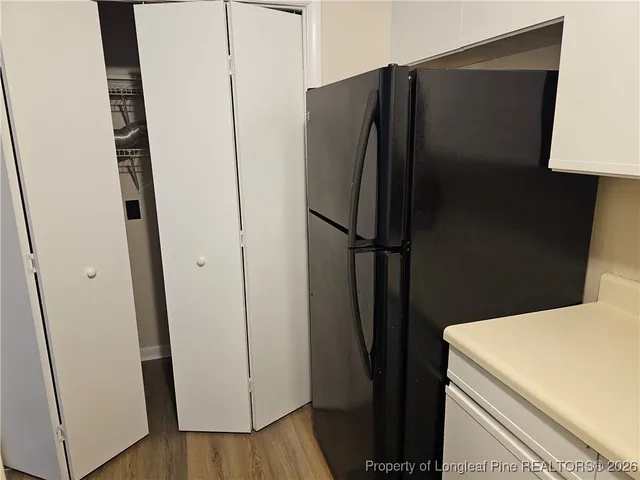 a kitchen with a sink stove and microwave