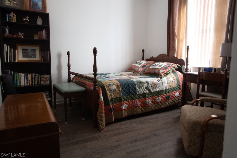 5517 Spanish River Road Fort Pierce, FL 34951 - Photo 15 of 24 a bedroom with a bed and a window