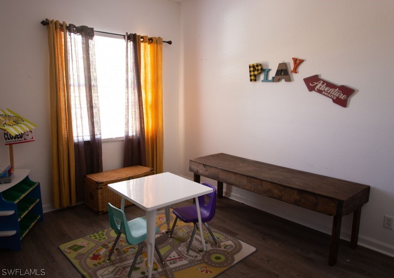 5517 Spanish River Road Fort Pierce, FL 34951 - Photo 17 of 24 a view of a workspace with furniture and a window