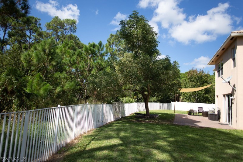 5517 Spanish River Road Fort Pierce, FL 34951 - Photo 21 of 24 a view of backyard with tree