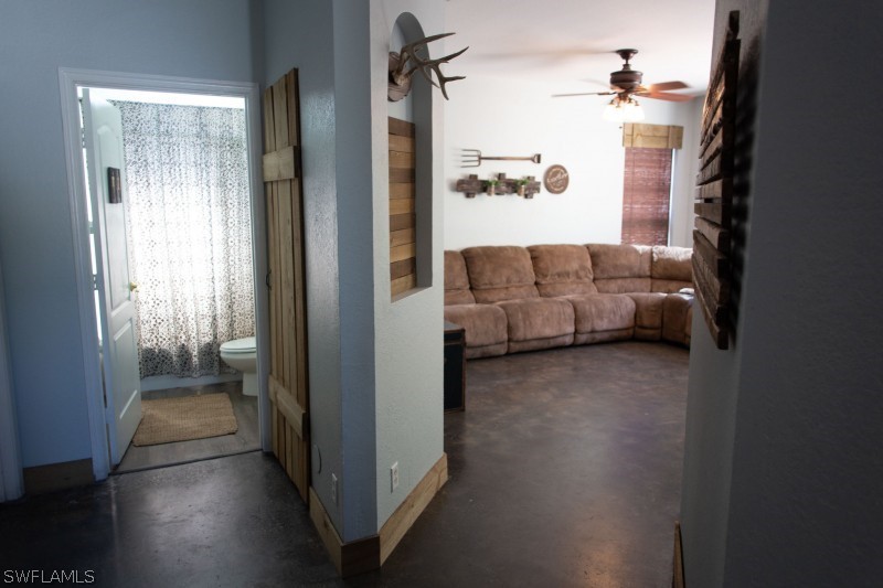 5517 Spanish River Road Fort Pierce, FL 34951 - Photo 9 of 24 a view of a livingroom with furniture and windows