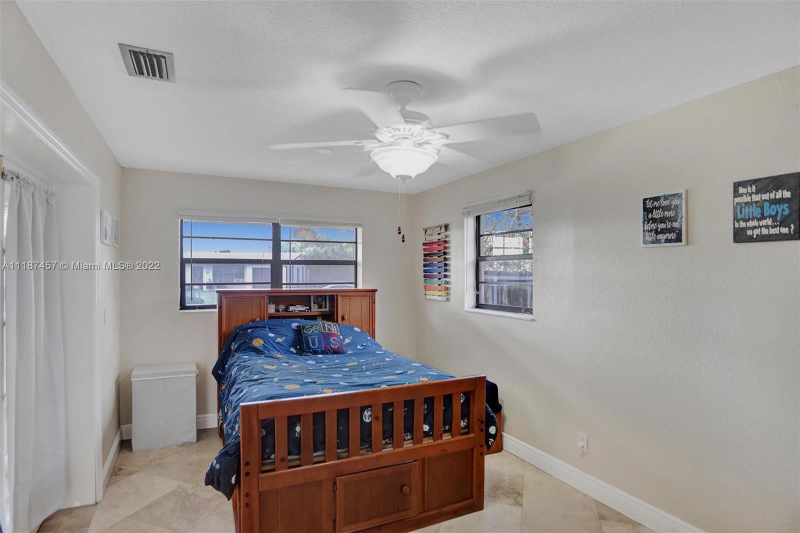 10401 Southwest 53rd Street Miami, FL 33165 - Photo 14 of 53 a living room with furniture and window