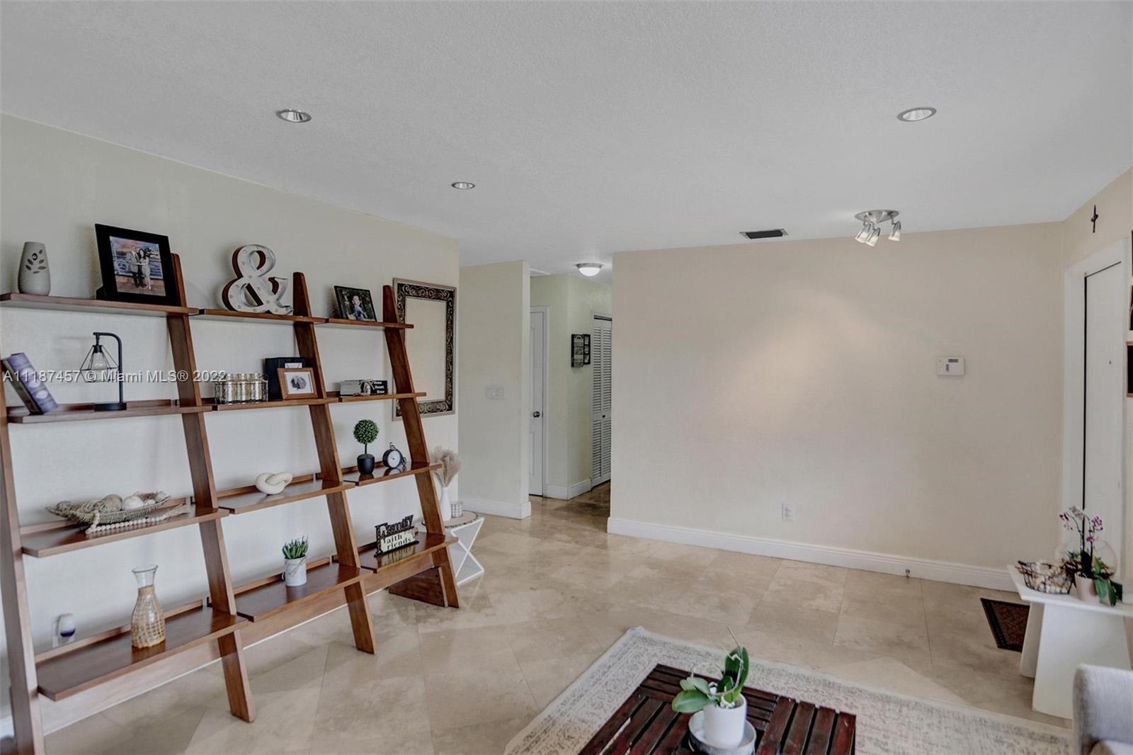 10401 Southwest 53rd Street Miami, FL 33165 - Photo 18 of 53 a view of a livingroom with furniture and a couch