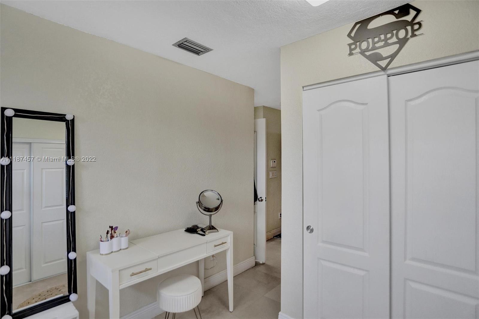 10401 Southwest 53rd Street Miami, FL 33165 - Photo 25 of 53 a bathroom with a sink toilet and shower
