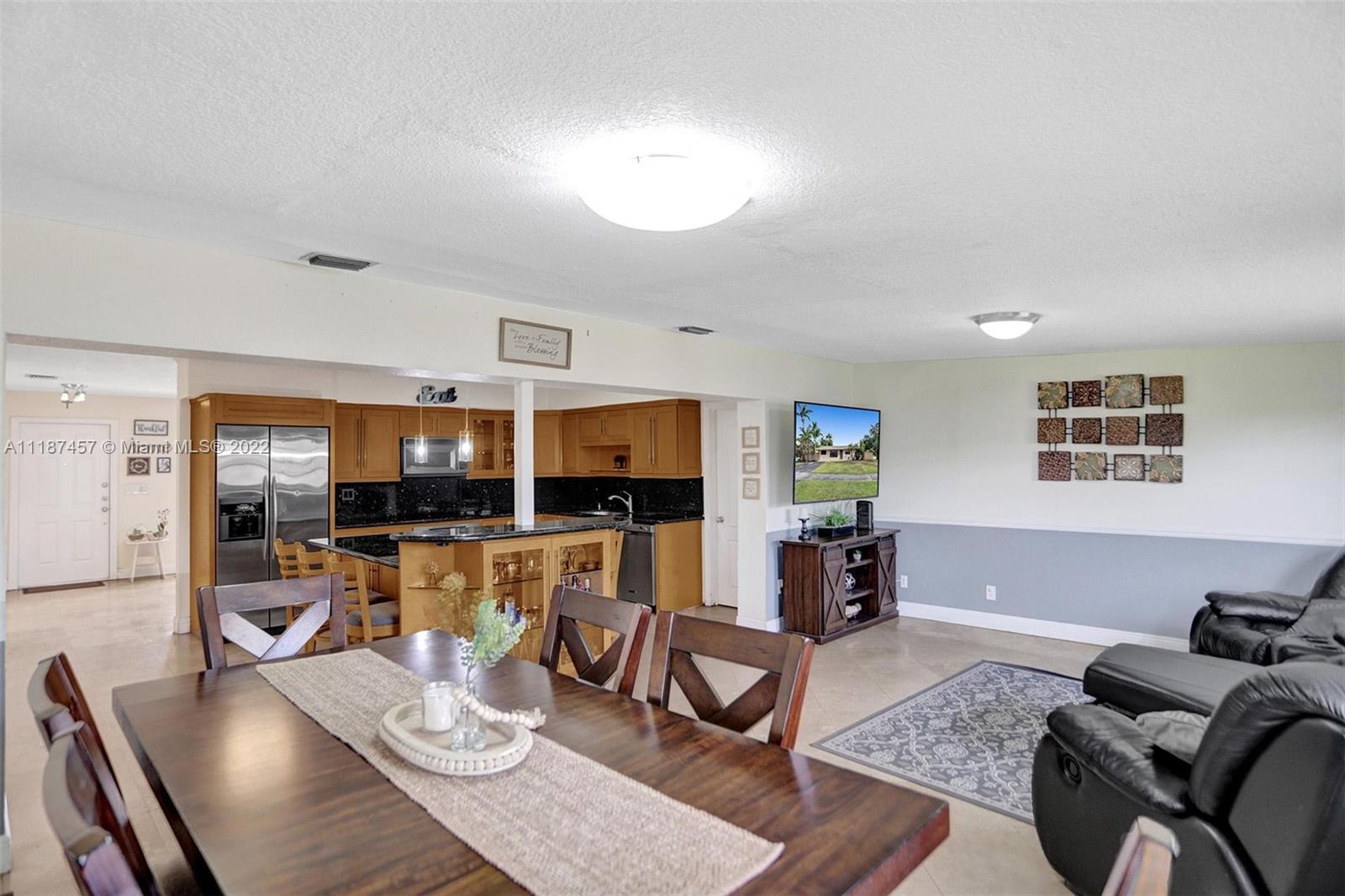 10401 Southwest 53rd Street Miami, FL 33165 - Photo 35 of 53 a living room with furniture and wooden floor