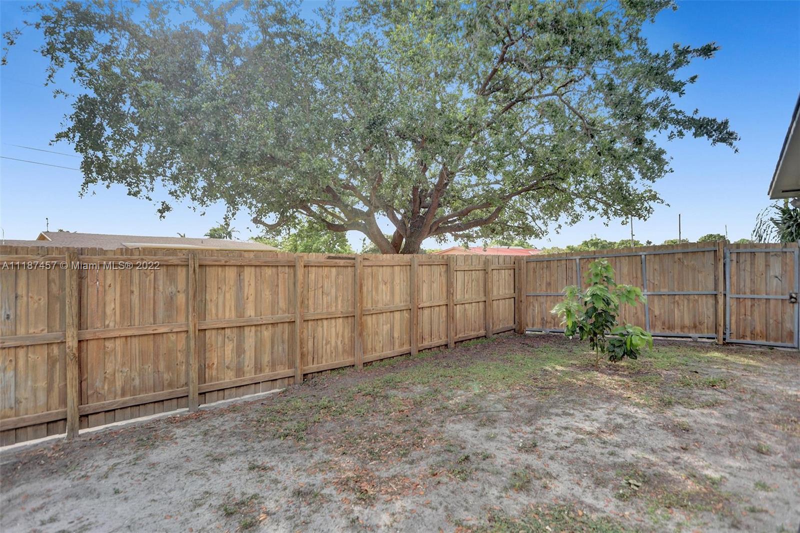 10401 Southwest 53rd Street Miami, FL 33165 - Photo 42 of 53 a view of a backyard