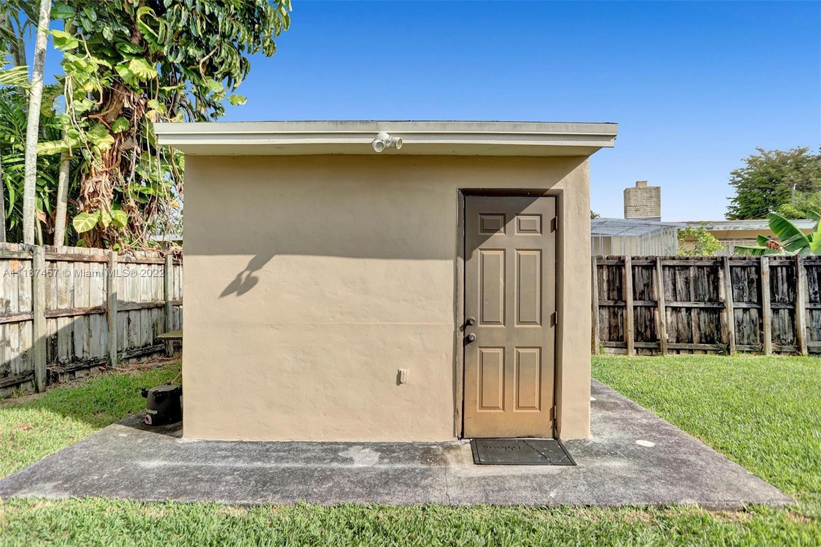 10401 Southwest 53rd Street Miami, FL 33165 - Photo 43 of 53 a view of a house with a yard