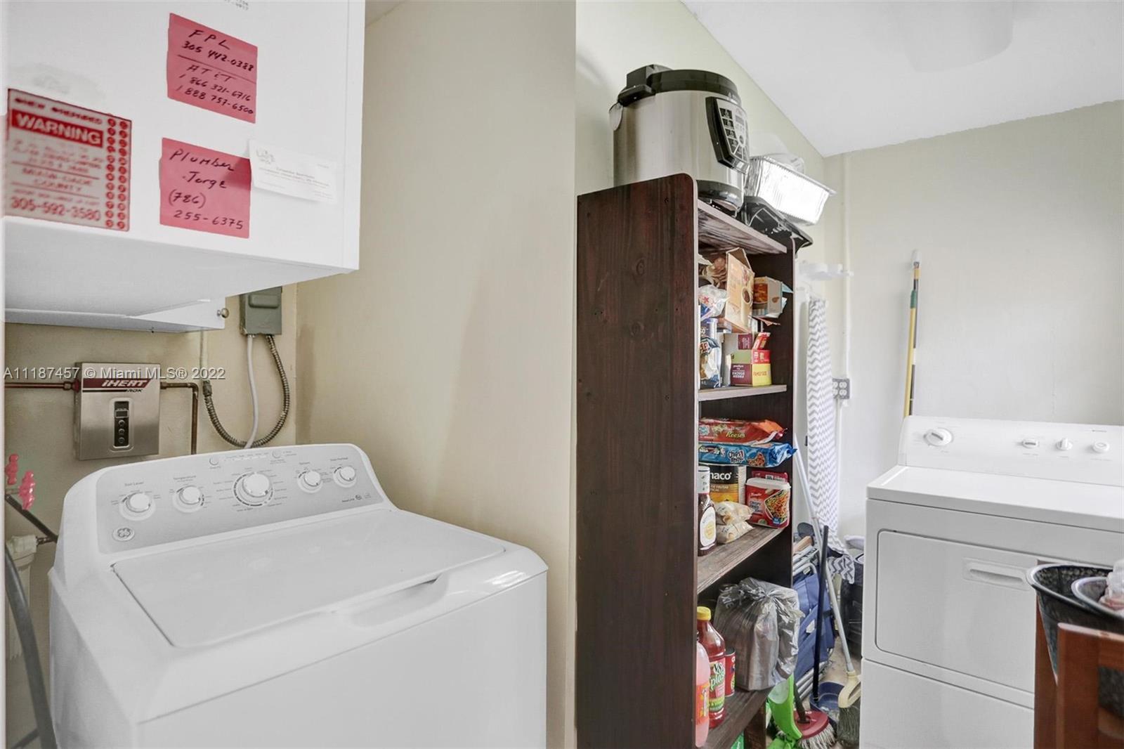 10401 Southwest 53rd Street Miami, FL 33165 - Photo 50 of 53 a utility room with dryer and washer