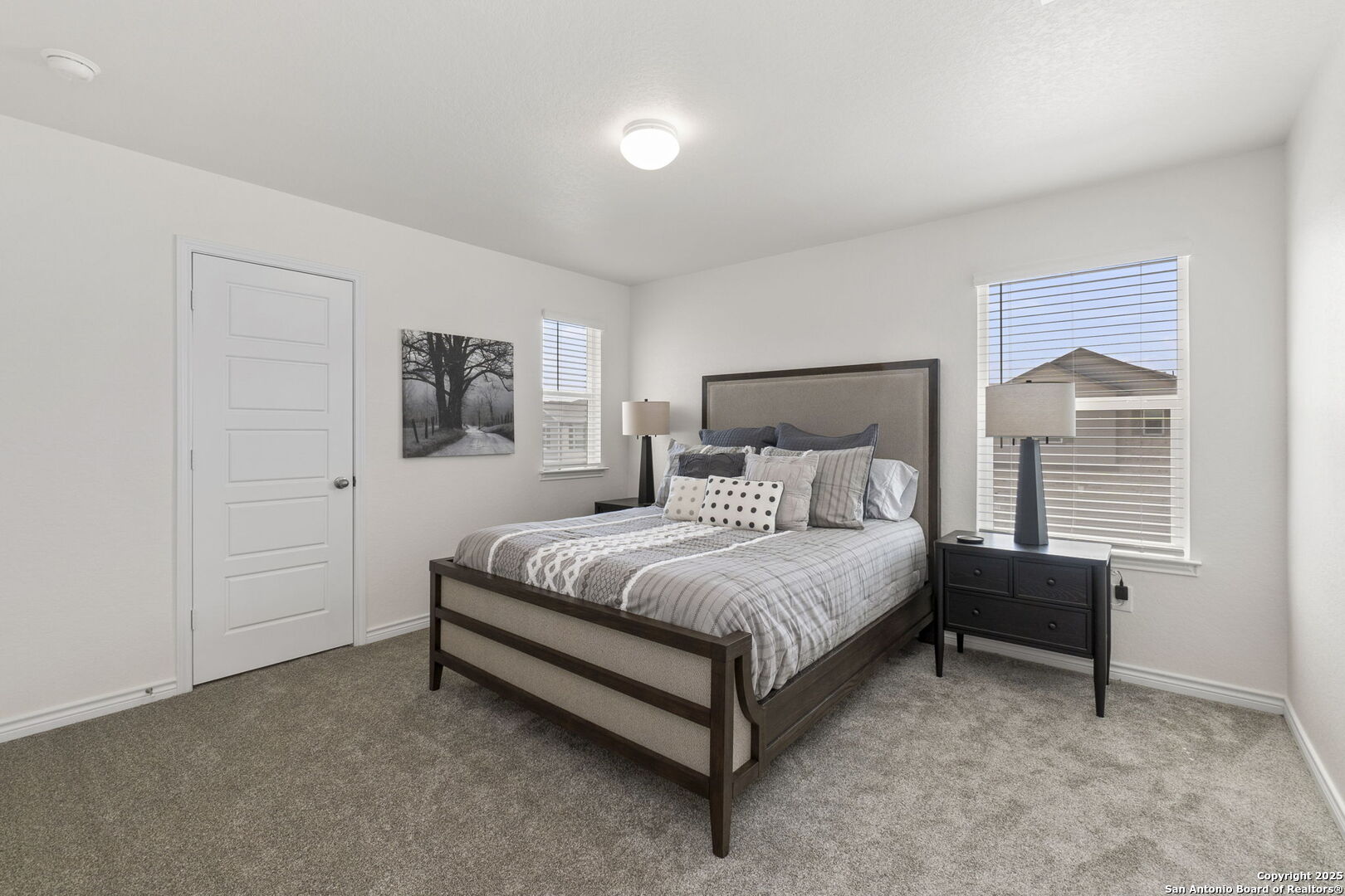 14839 Vance Jackson Road, Unit 1101 San Antonio, TX 78249 - Photo 15 of 31 a spacious bedroom with a bed and window