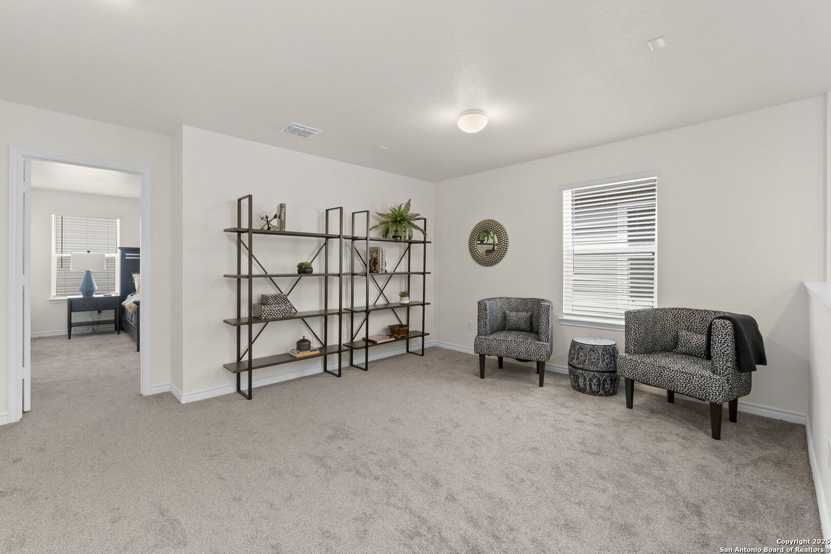 14839 Vance Jackson Road, Unit 1101 San Antonio, TX 78249 - Photo 19 of 31 a view of a livingroom with furniture and a window