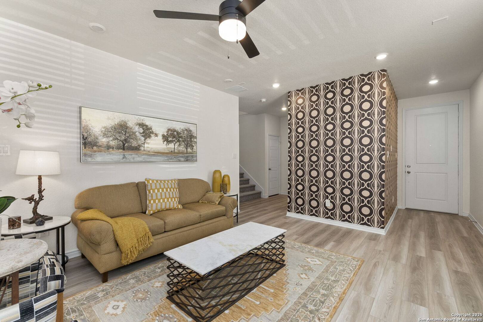 14839 Vance Jackson Road, Unit 1101 San Antonio, TX 78249 - Photo 5 of 31 a living room with furniture and a rug