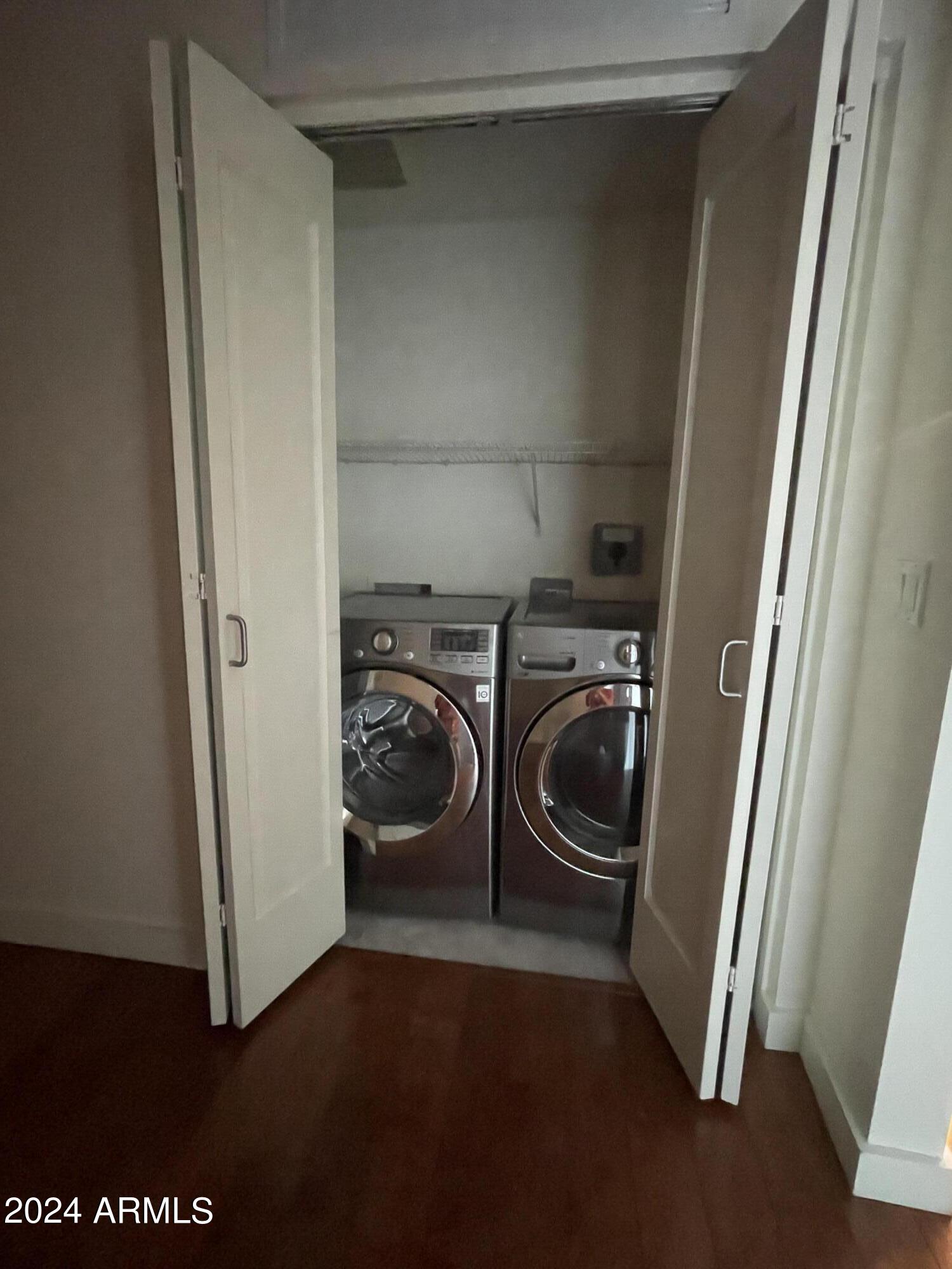 310 South 4th Street, Unit 1507 Phoenix, AZ 85004 - Photo 23 of 24 a utility room with dryer and washer