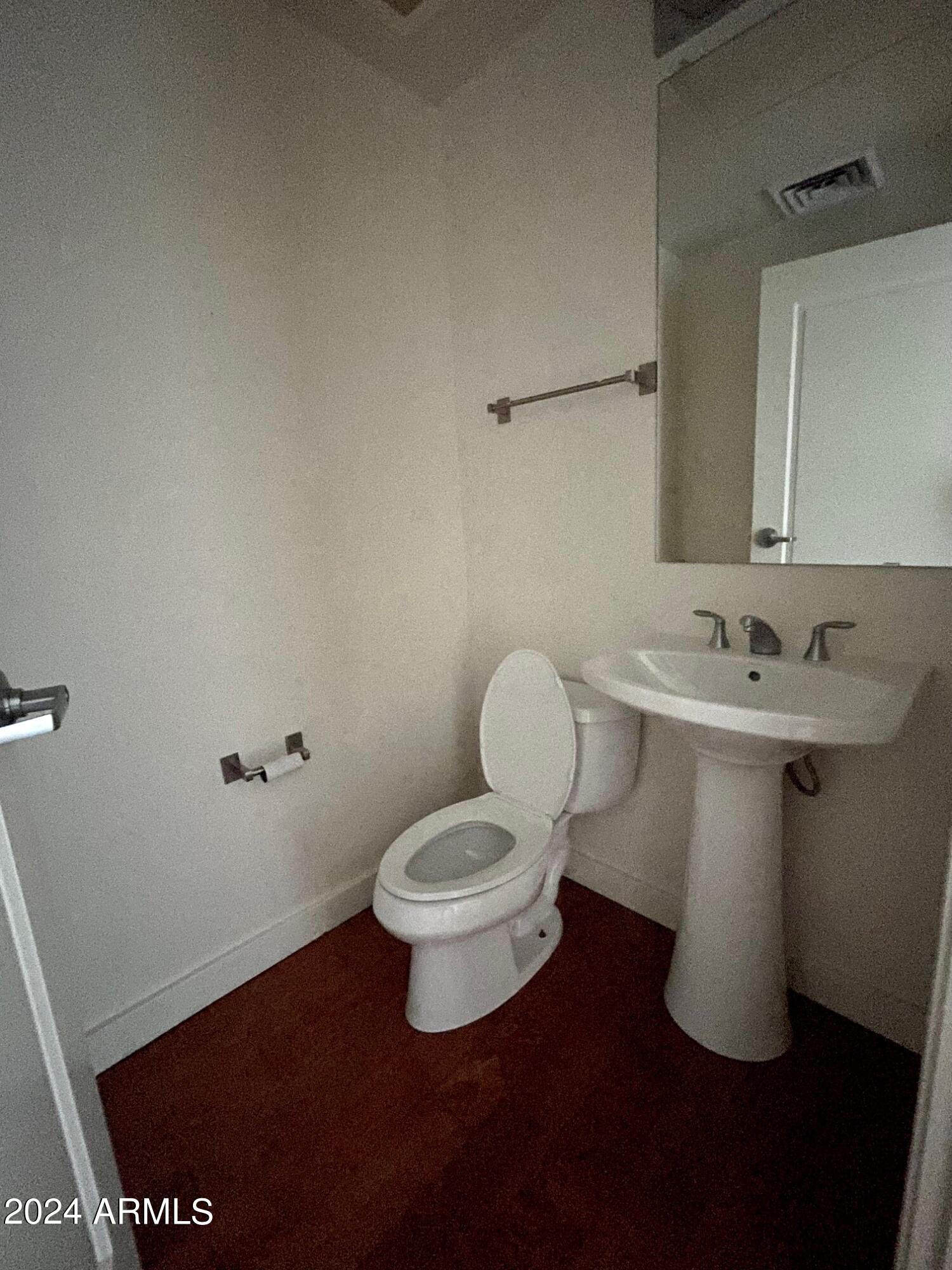 310 South 4th Street, Unit 1507 Phoenix, AZ 85004 - Photo 24 of 24 a bathroom with a sink and a toilet