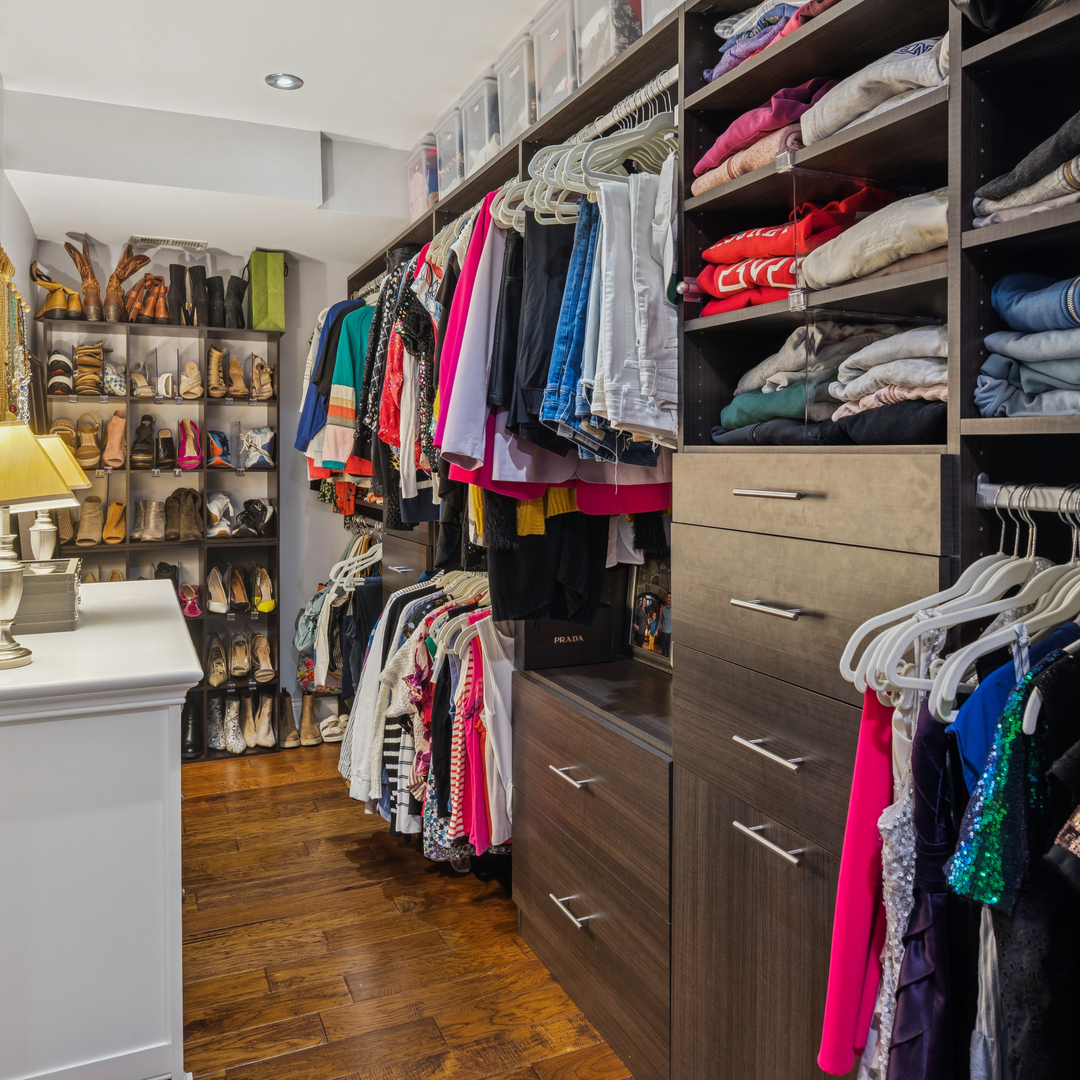 1329 North Mohawk Street, Unit 1 Chicago, IL 60610 - Photo 14 of 25 a view of walk in closet with clothes and shoes