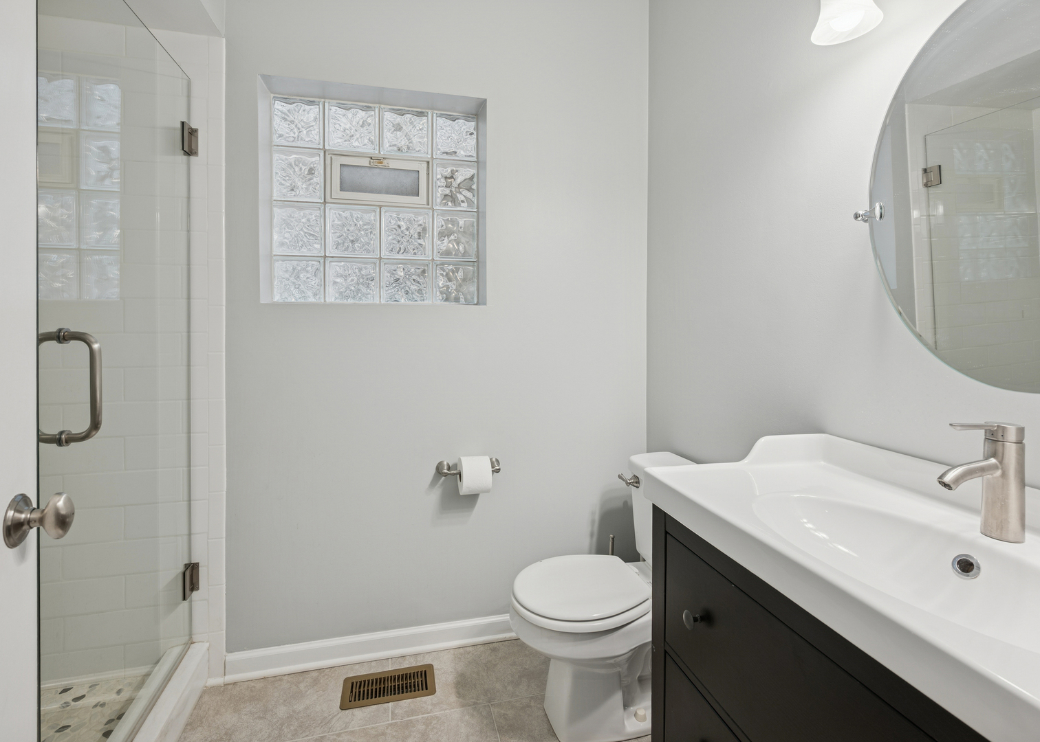 1329 North Mohawk Street, Unit 1 Chicago, IL 60610 - Photo 21 of 25 a bathroom with a sink toilet and shower
