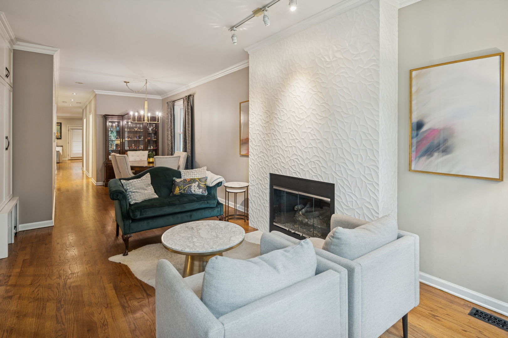1329 North Mohawk Street, Unit 1 Chicago, IL 60610 - Photo 4 of 25 a living room with furniture and a fireplace