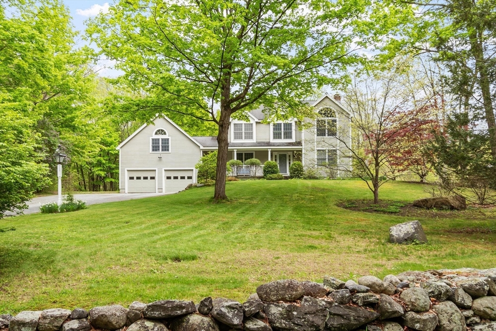 94 Turner Road Townsend, MA 01469 - Photo 39 of 42 a view of a house with a yard