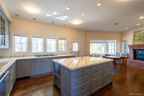 a kitchen with a table and chairs in it