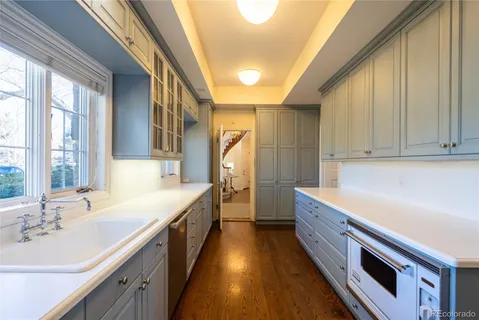 a view of a golf course with a tree