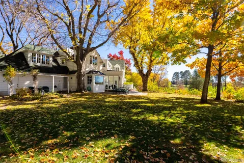 a view of a swimming pool with sitting area
