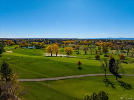 a view of a golf course with a lake