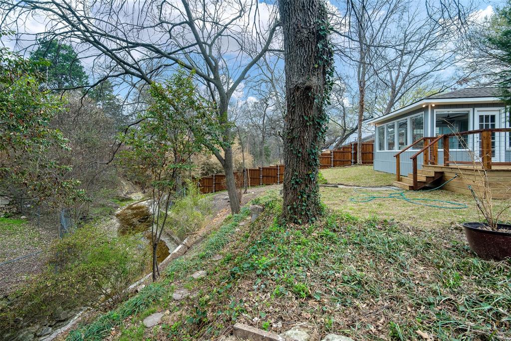 2540 El Cerrito Drive Dallas, TX 75228 - Photo 1 of 1 a backyard of a house with lots of green space