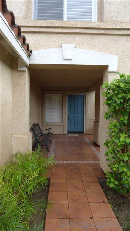 2352 Eastridge Loop Chula Vista, CA 91915 - Photo 2 of 21 a view of backyard with wheel chair and potted plants