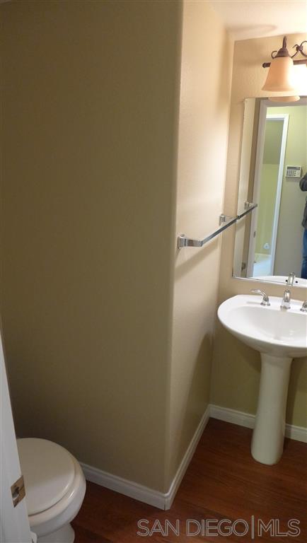 2352 Eastridge Loop Chula Vista, CA 91915 - Photo 11 of 21 a bathroom with a sink and a toilet