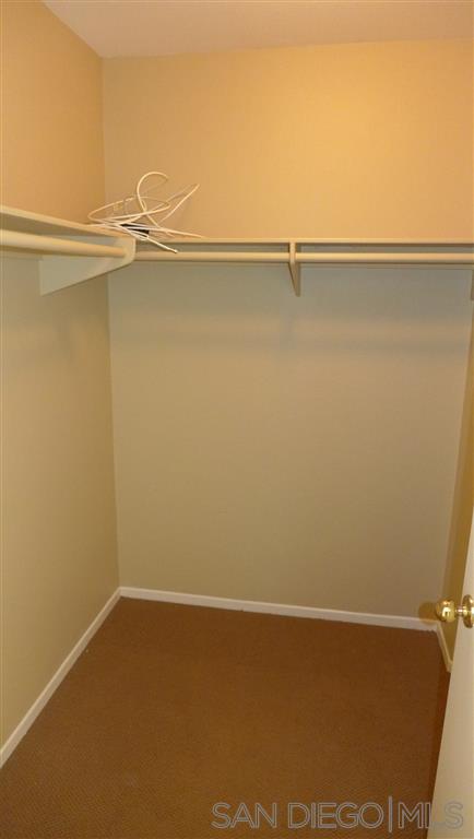 2352 Eastridge Loop Chula Vista, CA 91915 - Photo 17 of 21 a view of a room with racks on the wall