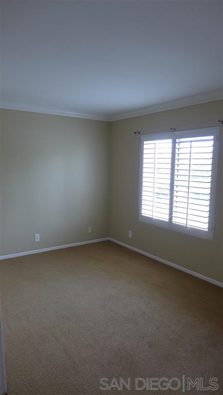 2352 Eastridge Loop Chula Vista, CA 91915 - Photo 18 of 21 an empty room with a window