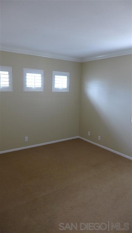 2352 Eastridge Loop Chula Vista, CA 91915 - Photo 19 of 21 an empty room with a window