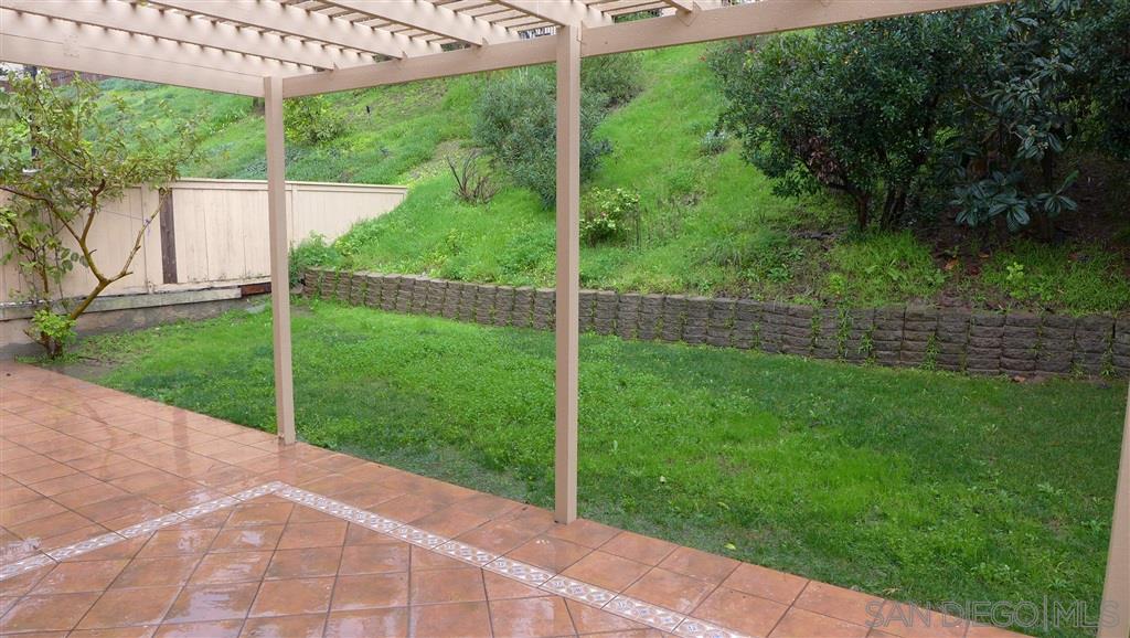 2352 Eastridge Loop Chula Vista, CA 91915 - Photo 3 of 21 a view of a backyard with a garden and plants