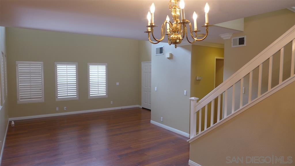 2352 Eastridge Loop Chula Vista, CA 91915 - Photo 10 of 21 a view of entryway and hall with wooden floor
