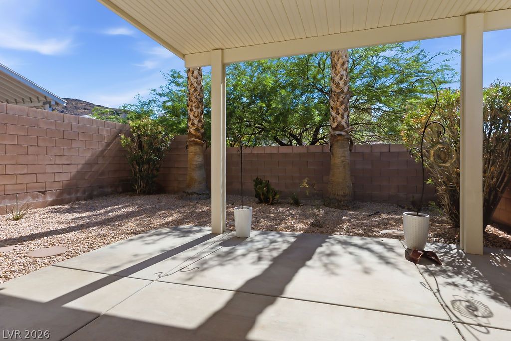 754 Solitude Point Avenue Henderson, NV 89012 - Photo 18 of 38 A private, covered patio area offers a cool, shaded retreat from the sun.