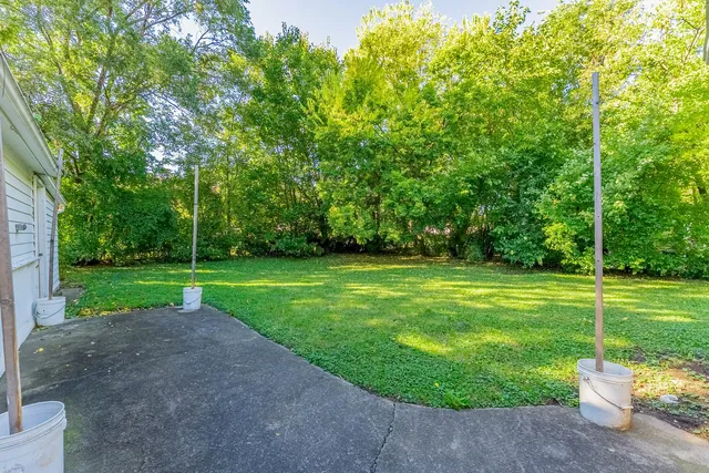 a view of a house with a big yard