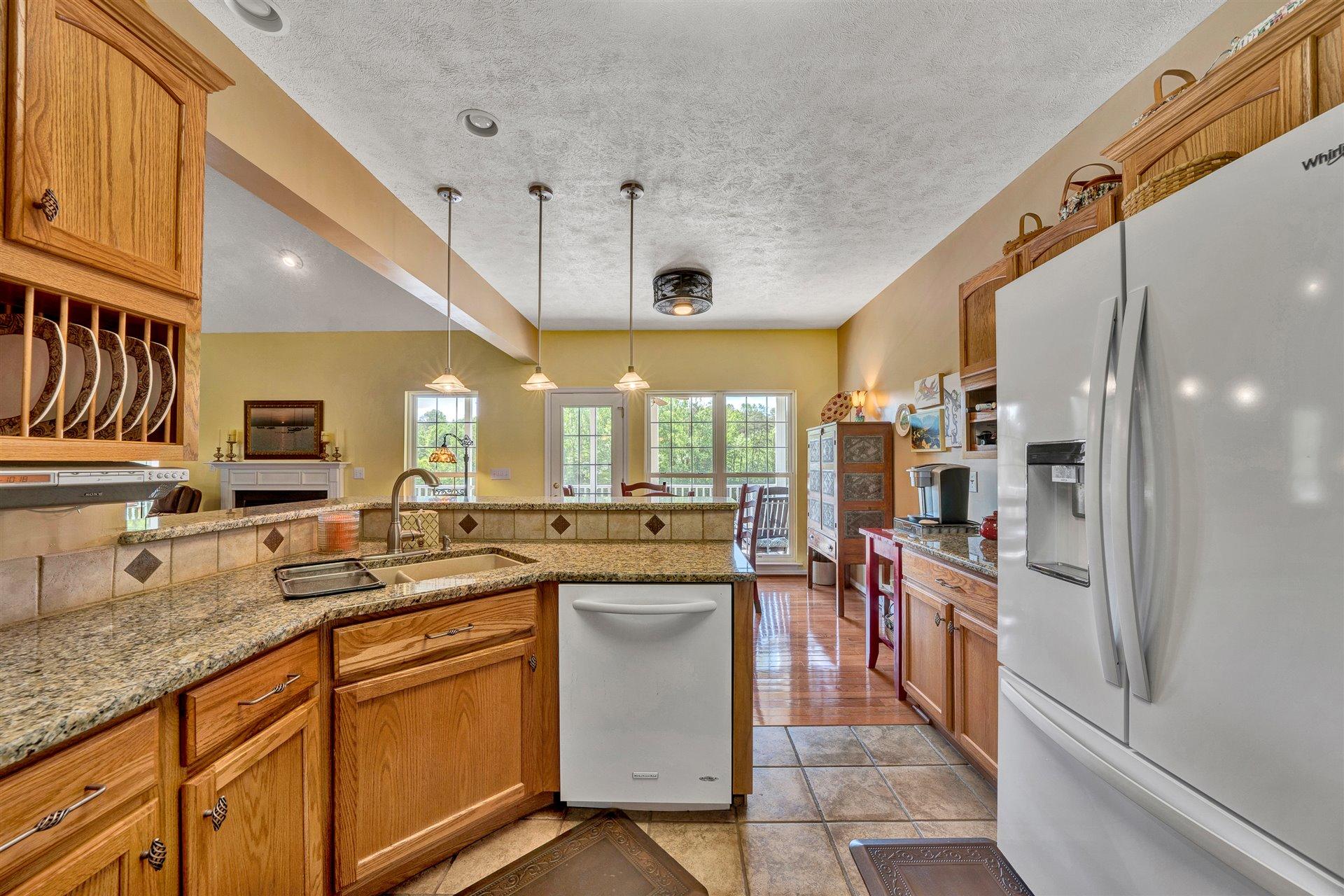 11 Cedar Bay Road Union Hall, VA 24176 - Photo 17 of 60 a kitchen with lots of counter top space and stainless steel appliances