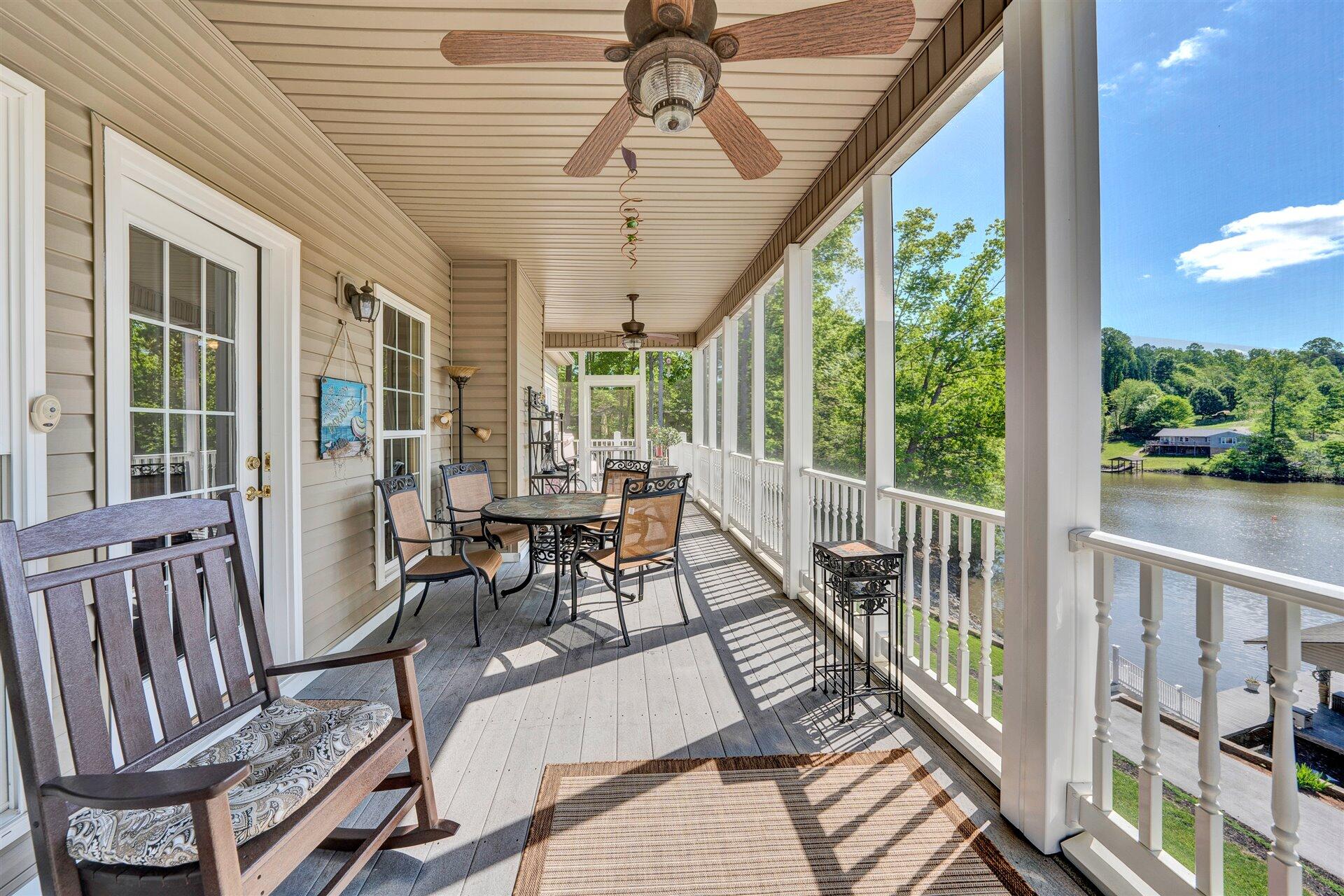 11 Cedar Bay Road Union Hall, VA 24176 - Photo 20 of 60 a view of a patio with table and chairs and wooden floor