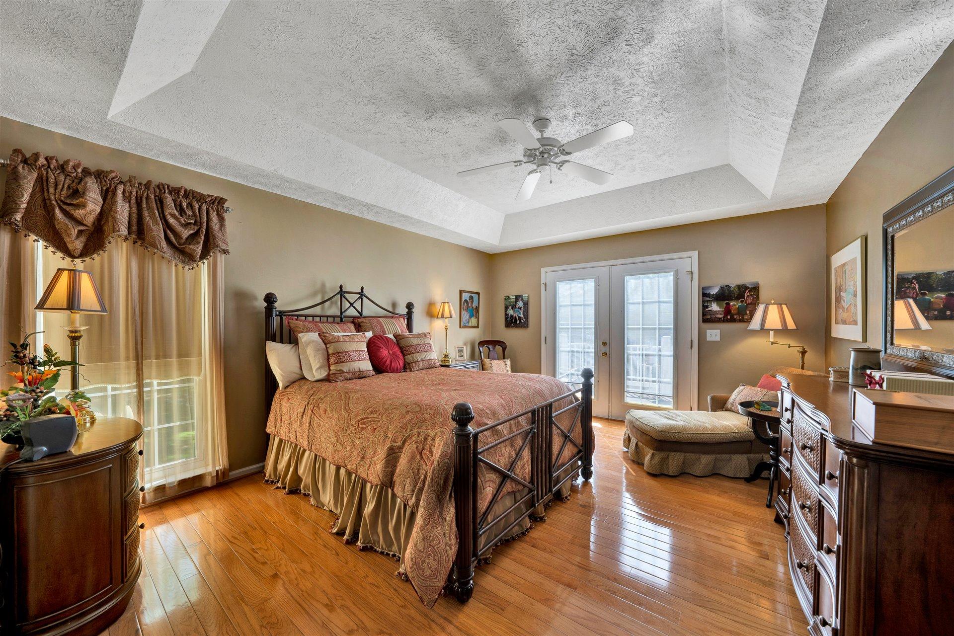 11 Cedar Bay Road Union Hall, VA 24176 - Photo 25 of 60 a large bedroom with a bed and wooden floor