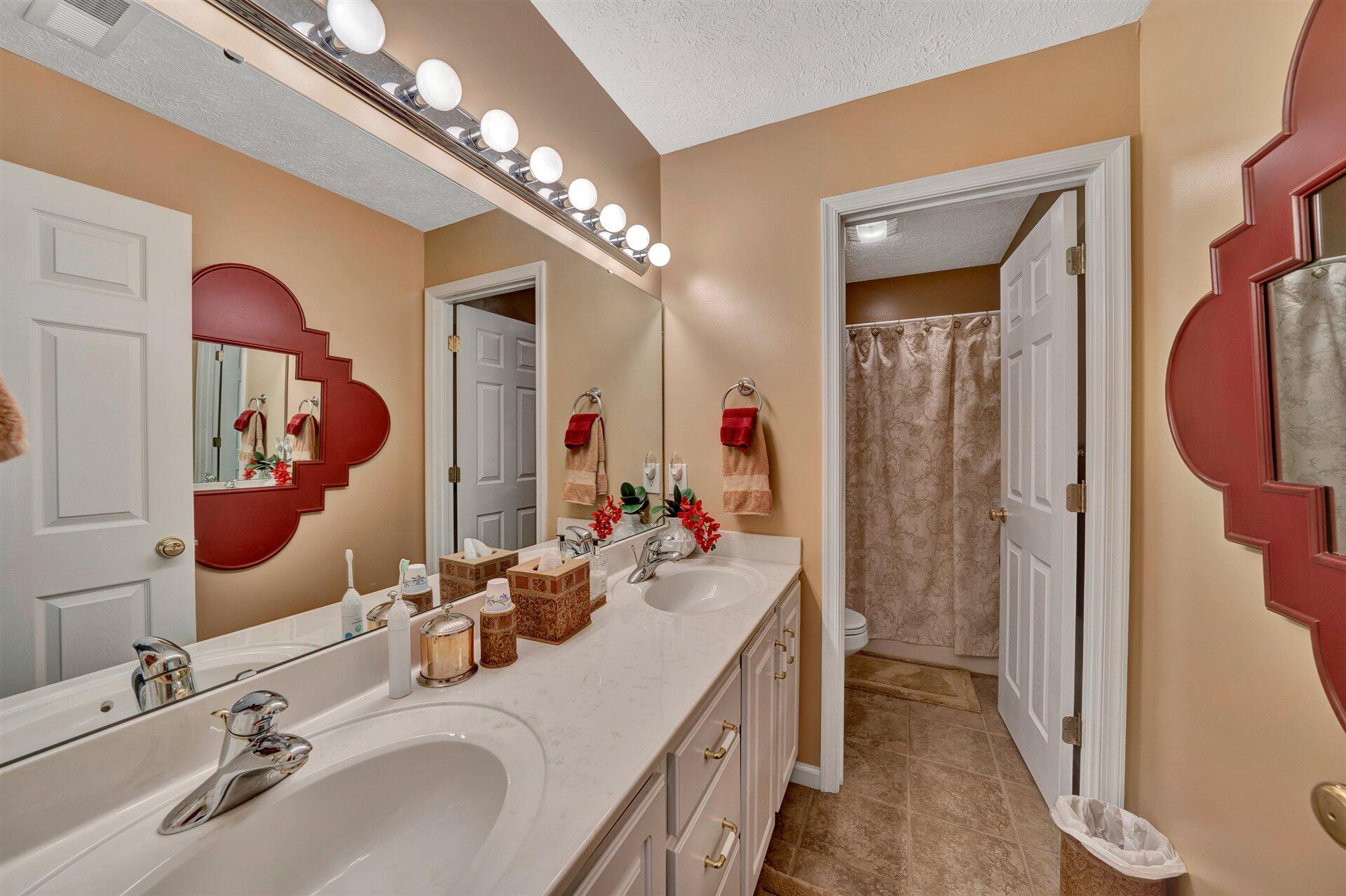 11 Cedar Bay Road Union Hall, VA 24176 - Photo 33 of 60 a bathroom with a sink double vanity and a mirror